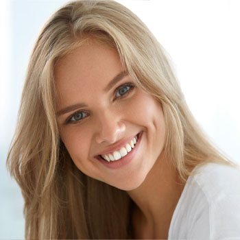 Picture of a blond woman smiling back at the camera