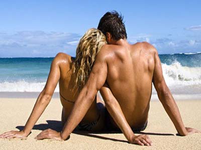 Picture of a couple enjoying the sun at the beach