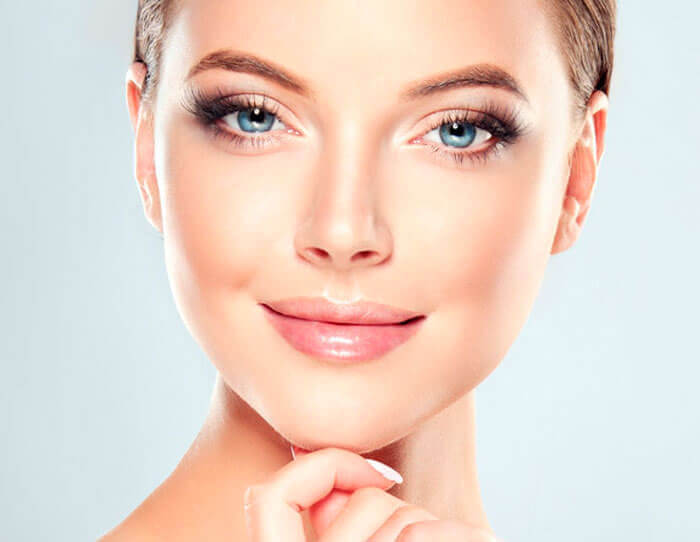 Picture of a beautiful woman showing her high quality chemical peel procedure.